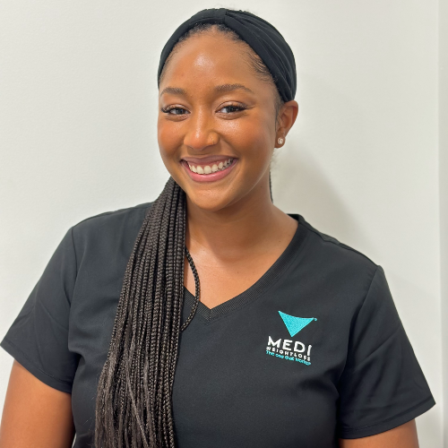Young smiling African American woman with braided hair wearing a black Medi shirt